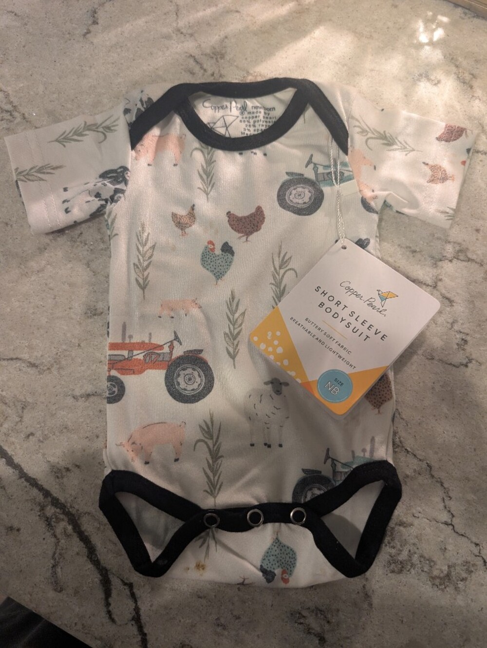 Brand New Copper pearl Onesie